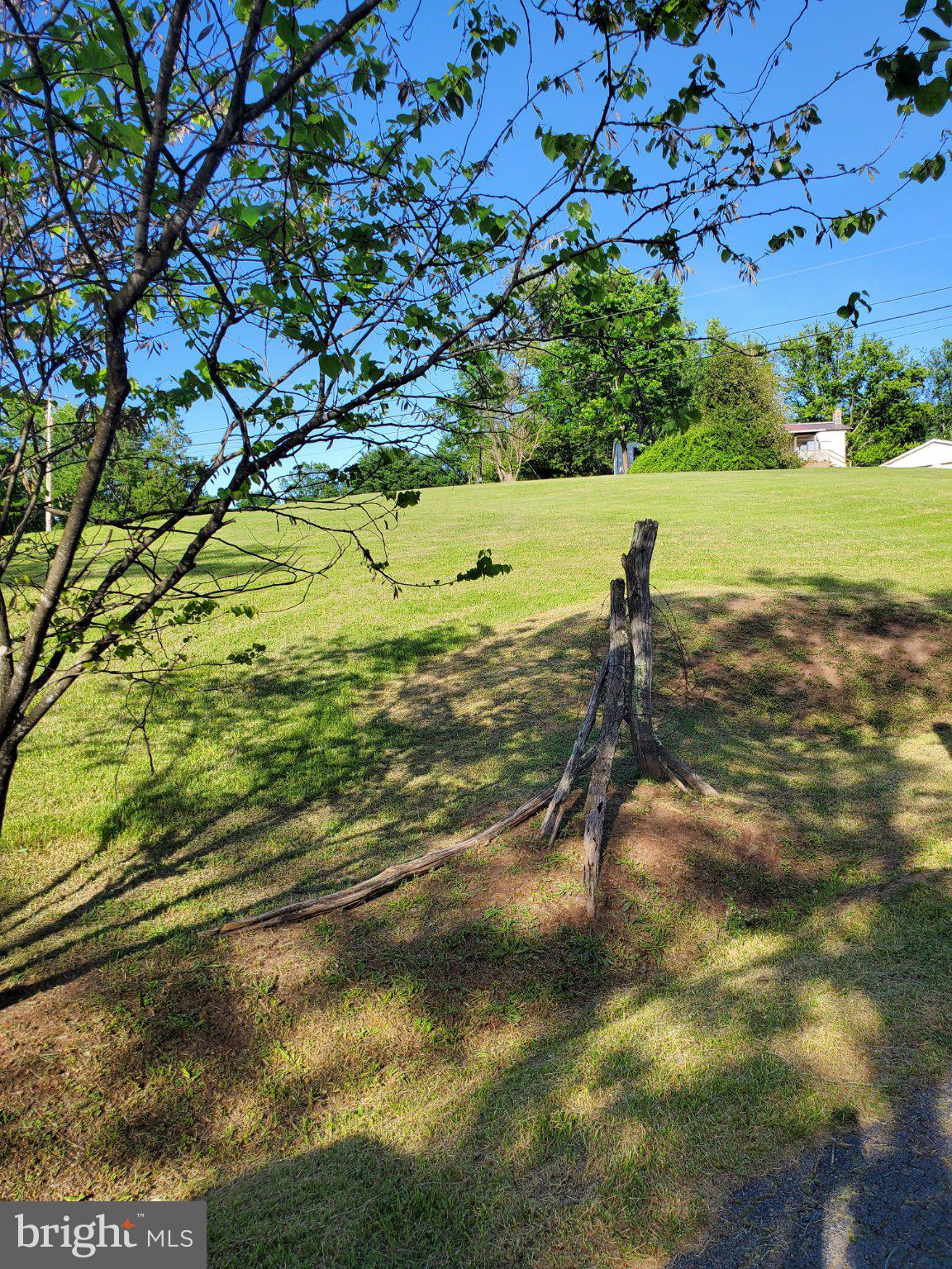 7881 Ford Hill Road Rio, WV 26755 - Photo 22 of 27 Serene hillside under clear skies.