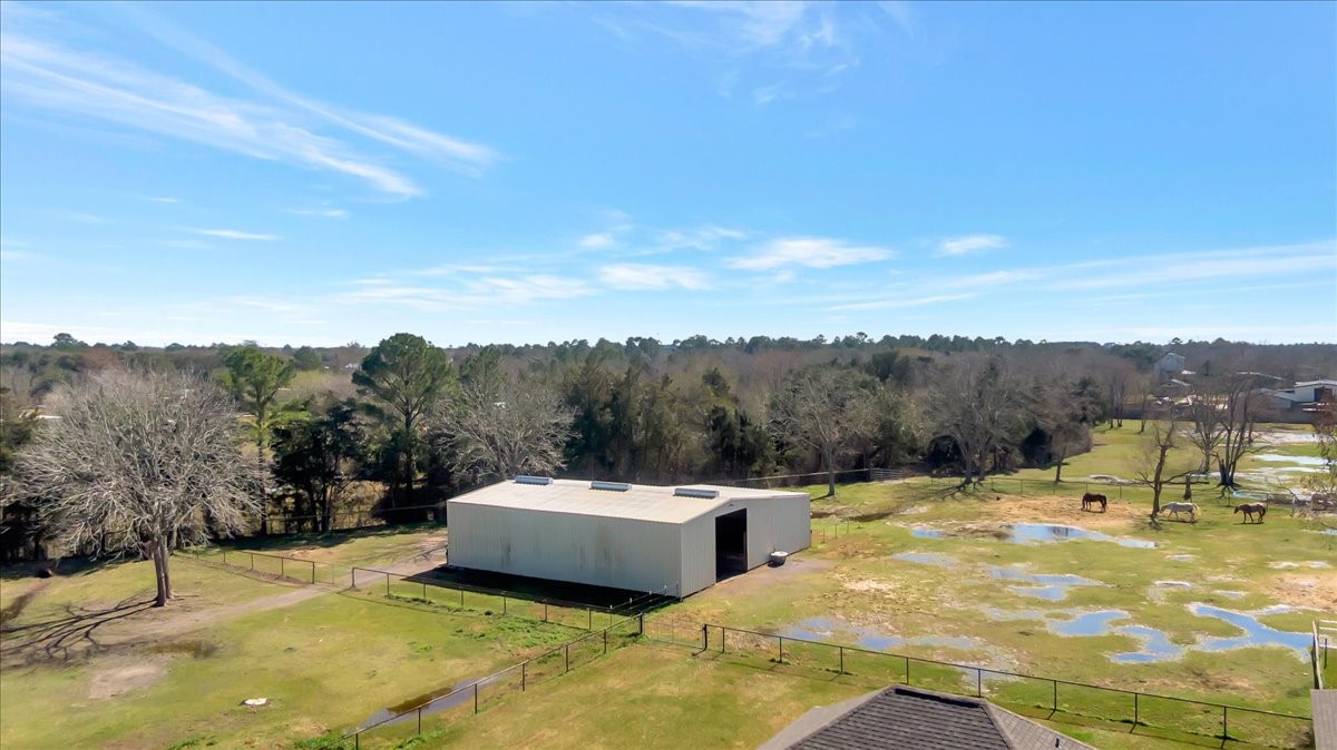 12335 2nd Street Santa Fe, TX 77539 - Photo 2 of 49 a view of a swimming pool with a mountain view