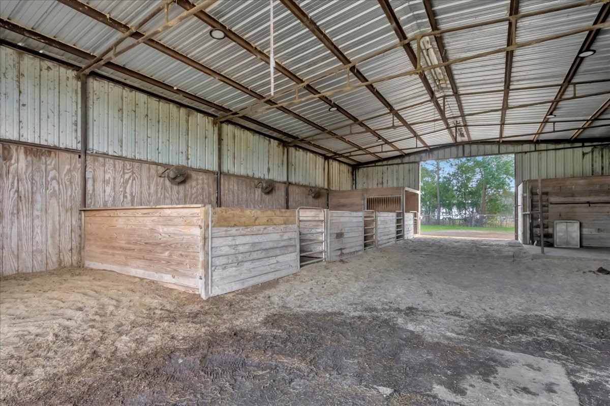 12335 2nd Street Santa Fe, TX 77539 - Photo 3 of 49 a view of a room with wooden walls