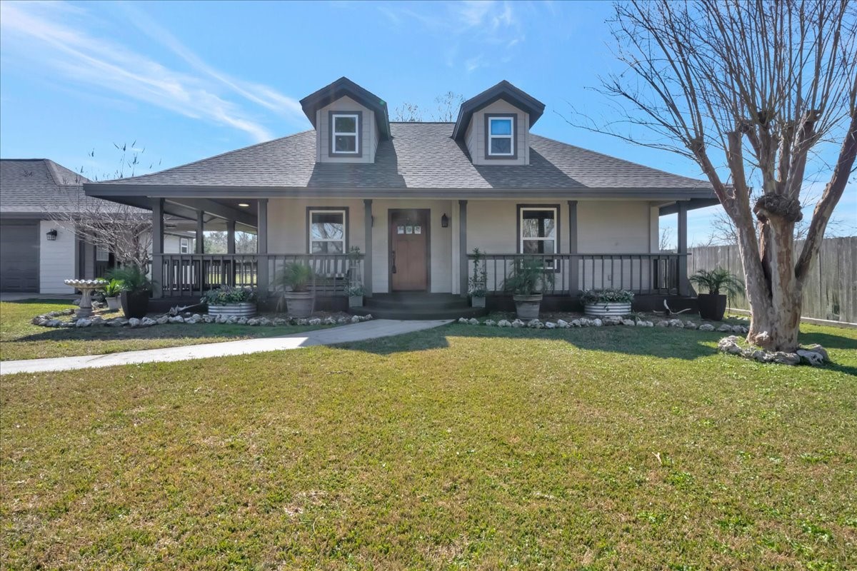 12335 2nd Street Santa Fe, TX 77539 - Photo 35 of 49 a front view of a house with swimming pool and furniture