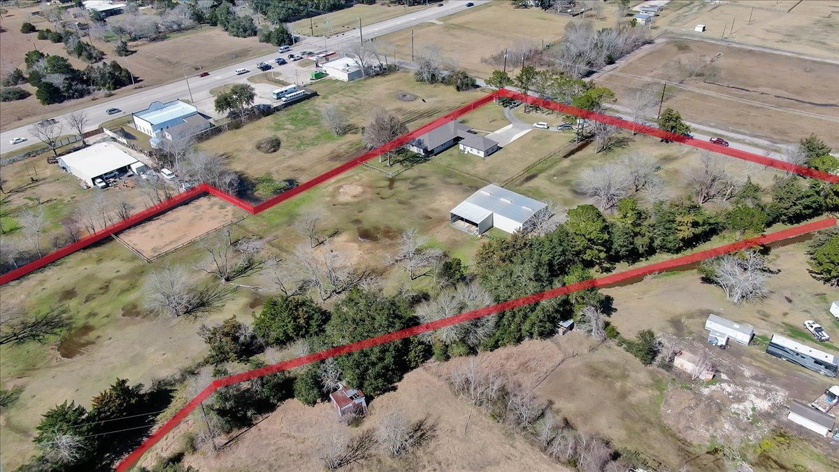 12335 2nd Street Santa Fe, TX 77539 - Photo 45 of 49 an aerial view of residential house with an outdoor space