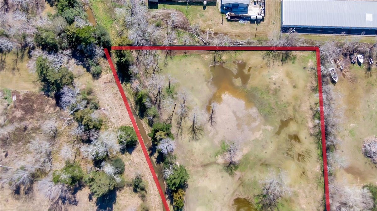 12335 2nd Street Santa Fe, TX 77539 - Photo 46 of 49 a view of a wooden bridge