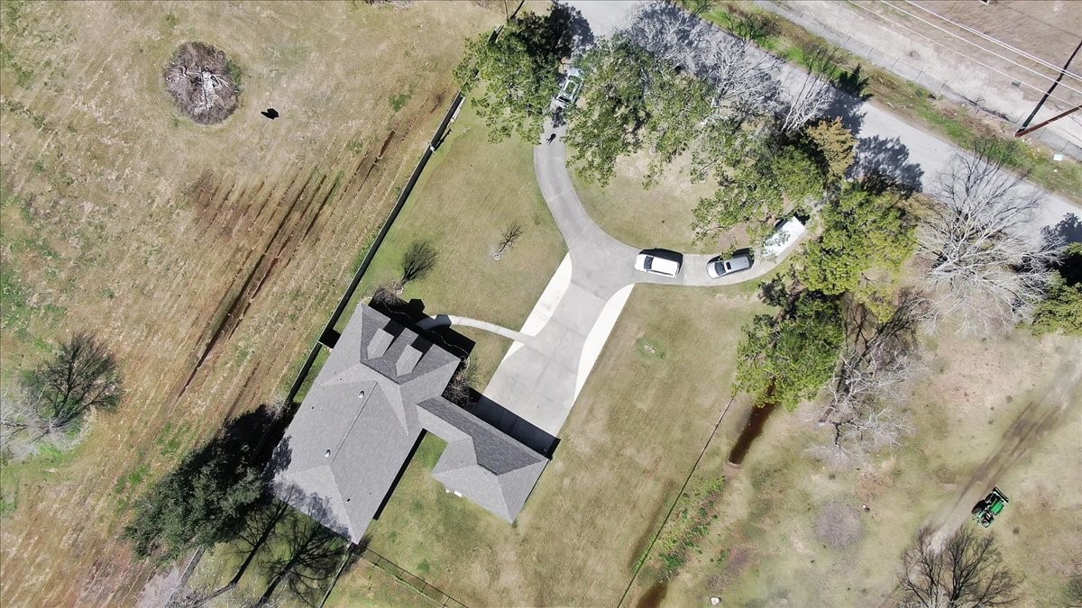 12335 2nd Street Santa Fe, TX 77539 - Photo 49 of 49 an aerial view of a house with swimming pool