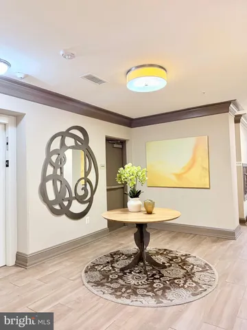 a view of a dining room with wooden floor