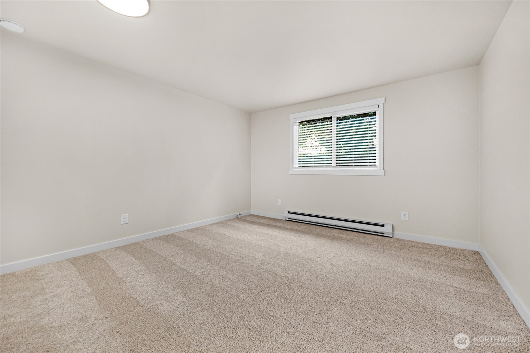 1302 Chestnut Street, Unit 2 Everett, WA 98201 - Photo 13 of 31 an empty room with a window