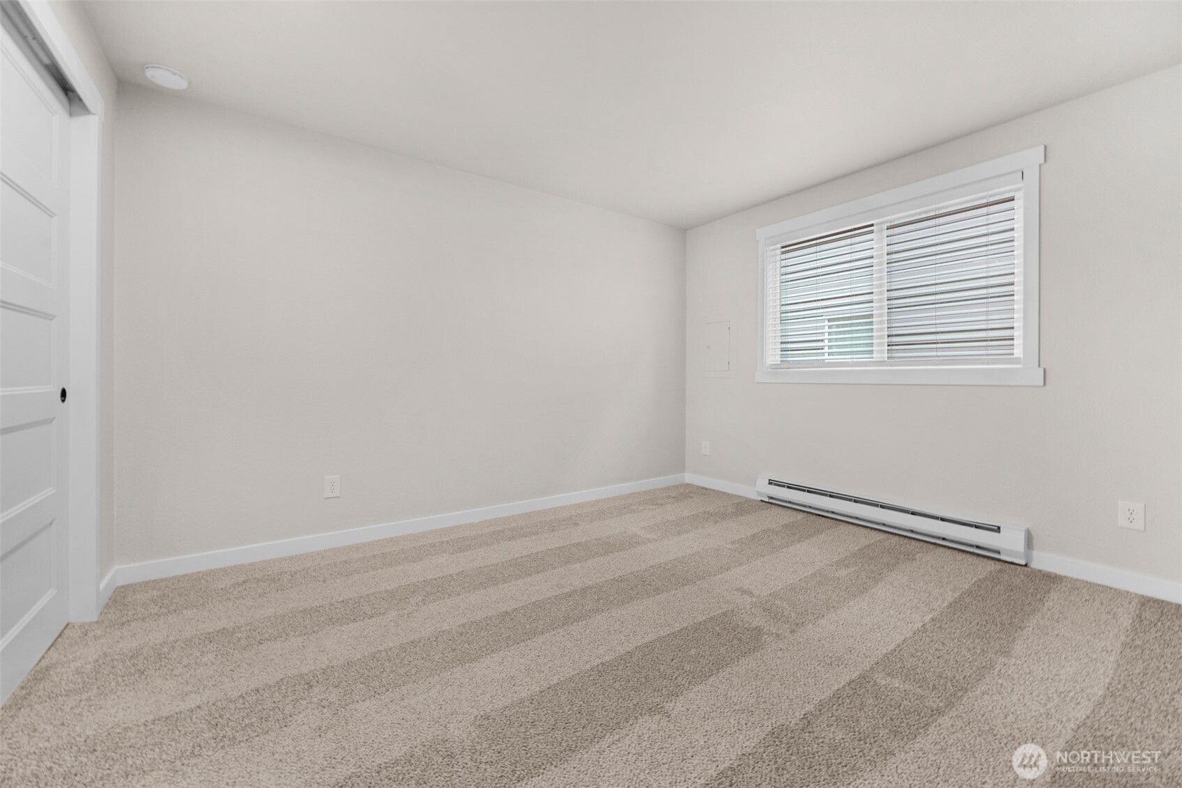 1302 Chestnut Street, Unit 2 Everett, WA 98201 - Photo 15 of 31 a view of an empty room with a window