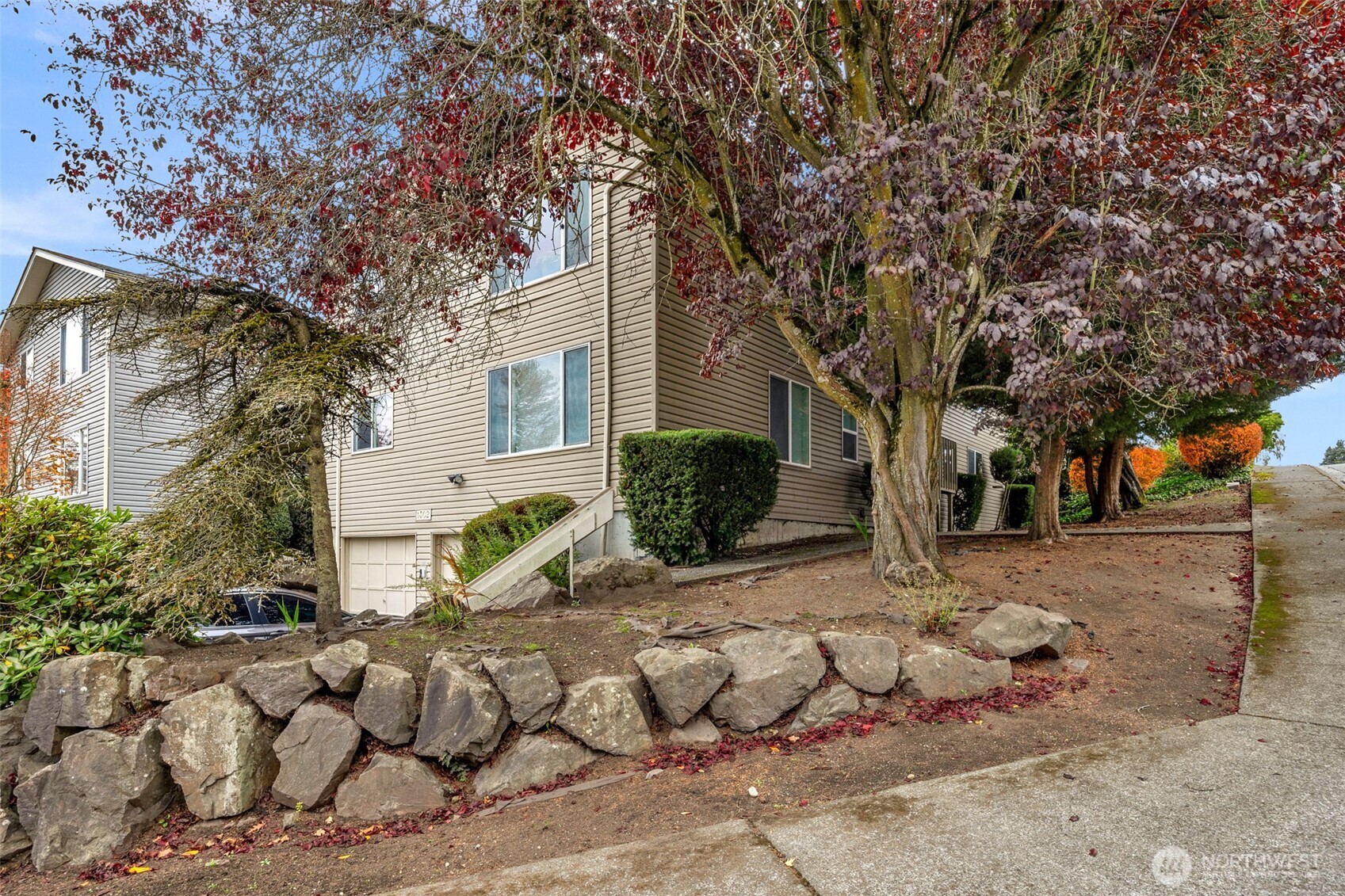 1302 Chestnut Street, Unit 2 Everett, WA 98201 - Photo 21 of 31 a view of a house with a yard