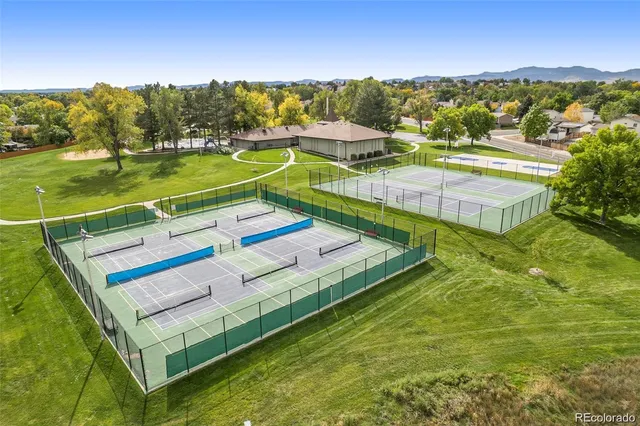 a view of a city with lawn chairs
