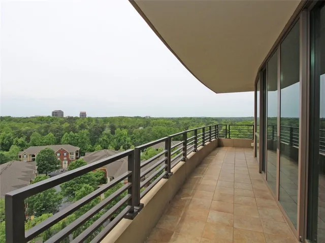 a view of a balcony with city view