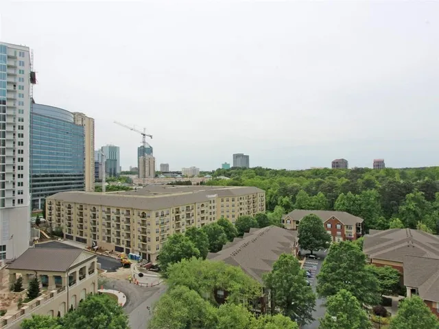 a view of a city with tall buildings
