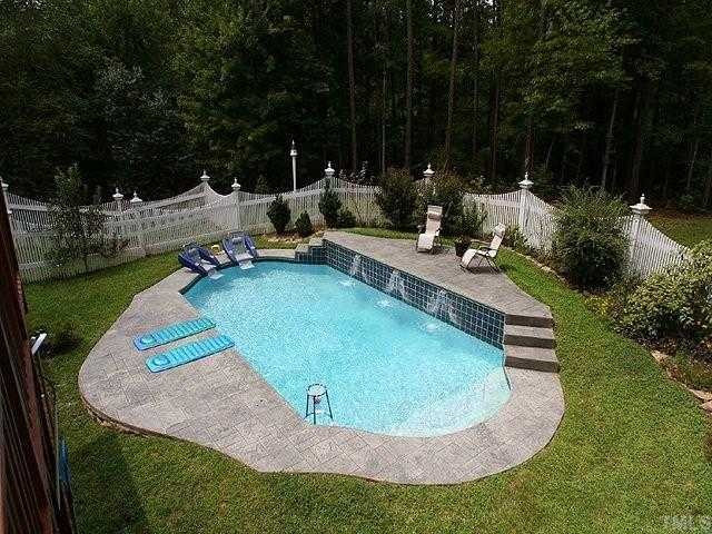 2332 Primrose Valley Court Raleigh, NC 27613 - Photo 12 of 12 A beautiful in-ground pool with waterfalls is enclosed by a custom-designed fence and provides great opportunities for relaxing or entertaining. Other