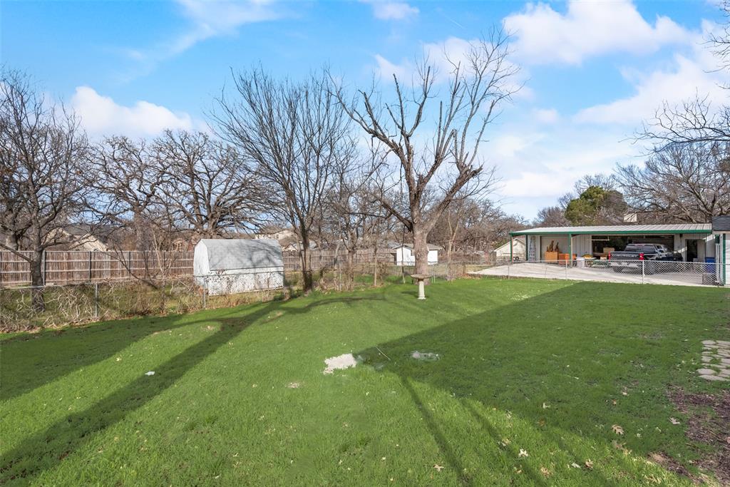 336 Shoreline Drive Azle, TX 76020 - Photo 19 of 20 a front view of a house with garden