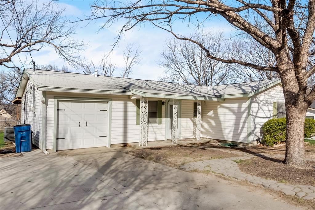 336 Shoreline Drive Azle, TX 76020 - Photo 2 of 20 a view of a house with a snow in the yard