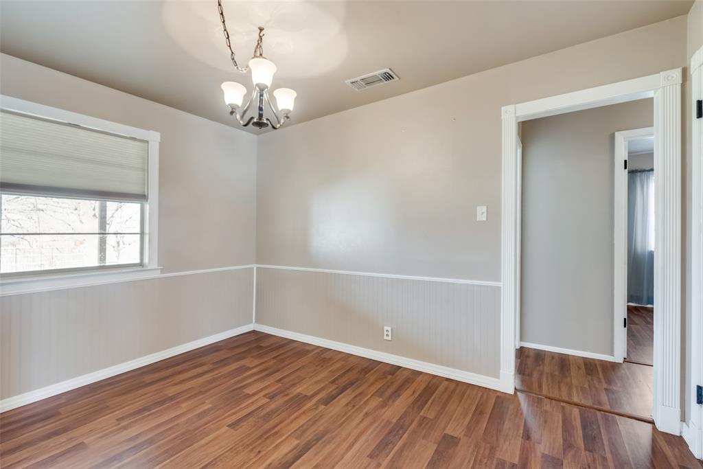 336 Shoreline Drive Azle, TX 76020 - Photo 7 of 20 wooden floor in an empty room with a window