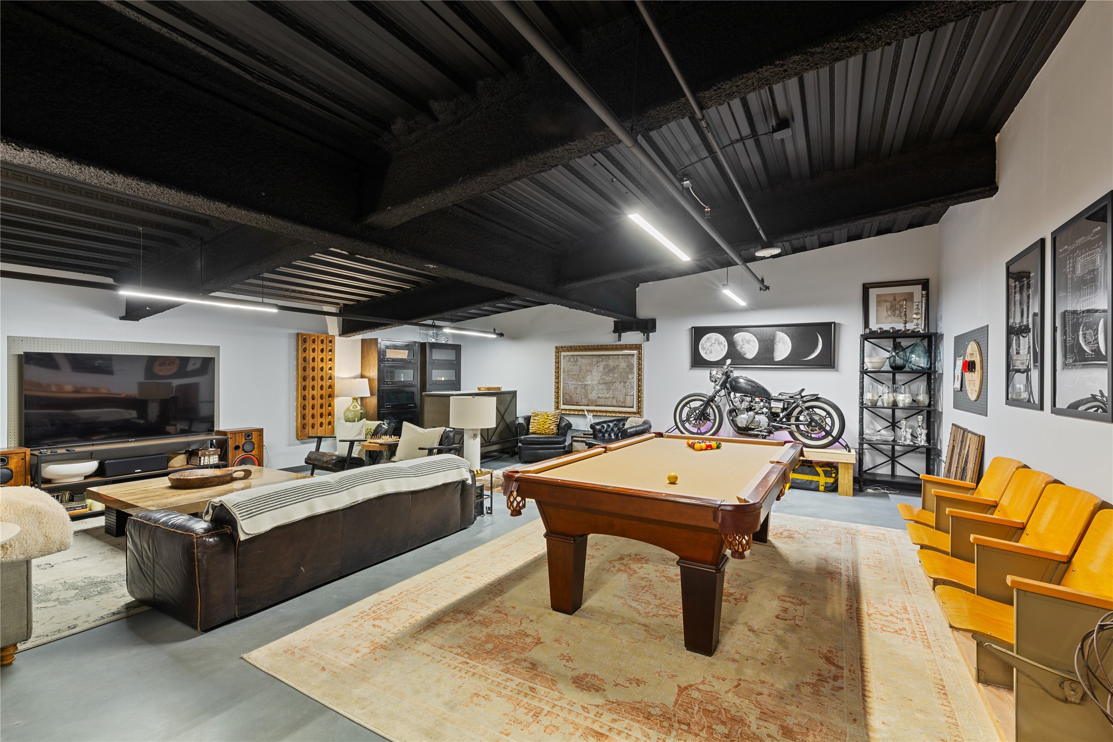 4229 Ranch Road 620 North, Unit 217 Austin, TX 78734 - Photo 6 of 17 a living room with furniture and a flat screen tv