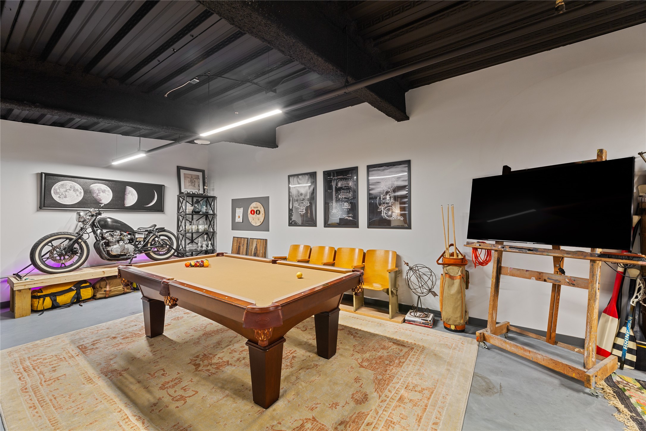 4229 Ranch Road 620 North, Unit 217 Austin, TX 78734 - Photo 8 of 17 a living room with furniture and a flat screen tv