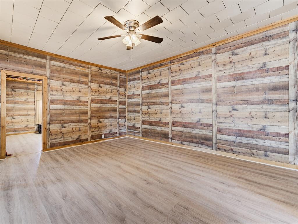 601 South Miller Street Decatur, TX 76234 - Photo 12 of 36 wooden floor in an empty room