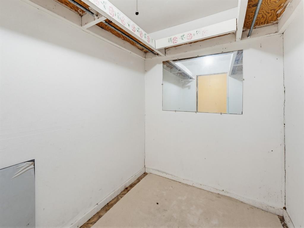 601 South Miller Street Decatur, TX 76234 - Photo 19 of 36 a view of a room with racks on the wall