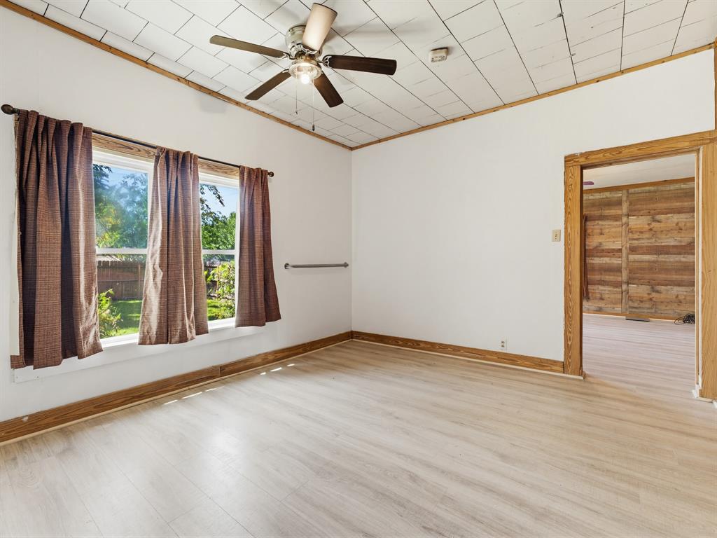 601 South Miller Street Decatur, TX 76234 - Photo 20 of 36 a view of an empty room with a window