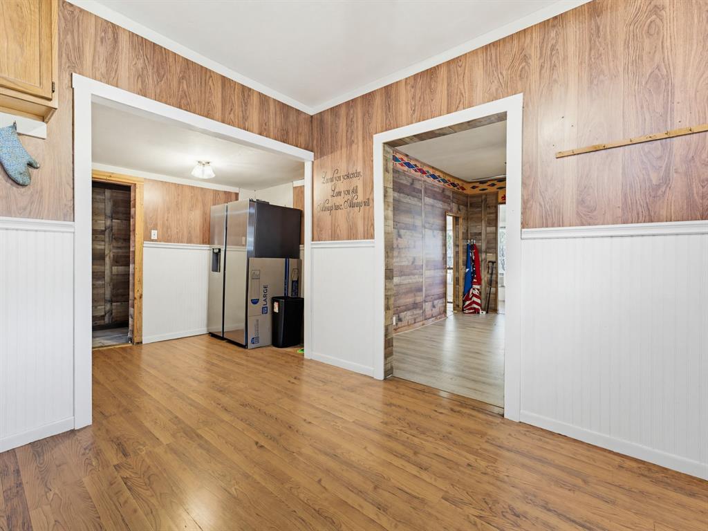 601 South Miller Street Decatur, TX 76234 - Photo 27 of 36 a view of a hallway view with wooden floor and staircase