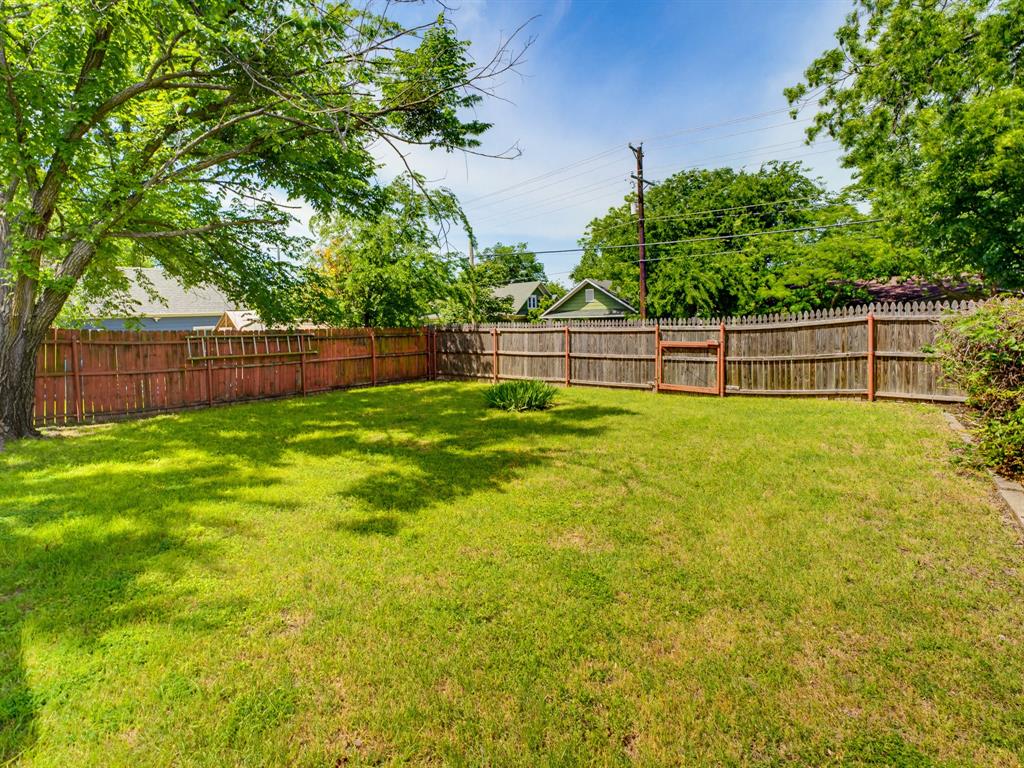601 South Miller Street Decatur, TX 76234 - Photo 33 of 36 a view of a yard with a small pool