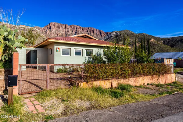 a view of hallway with livingroom and furniture