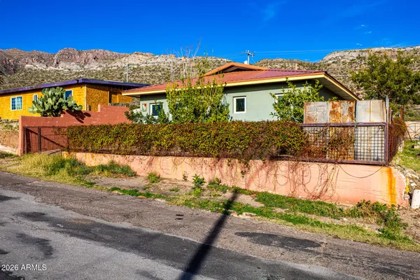 a view of an empty room and a window