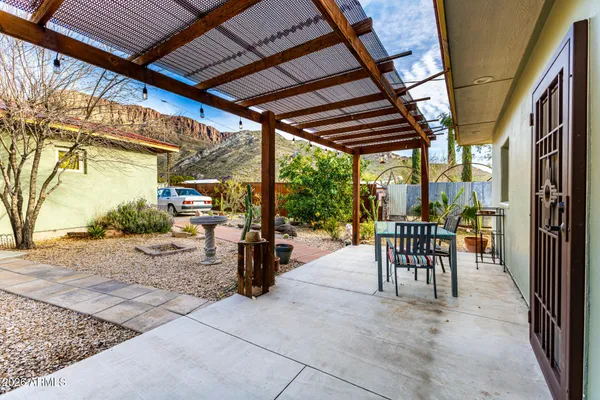 a view of a livingroom with furniture and windows