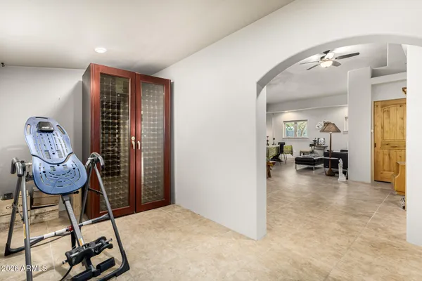 a kitchen with a sink cabinets and a refrigerator