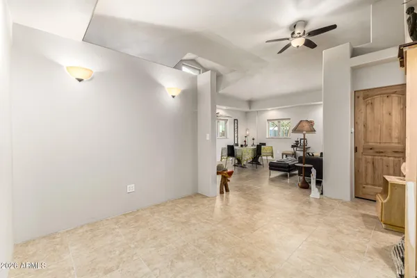 a bathroom with a toilet and a shower curtain