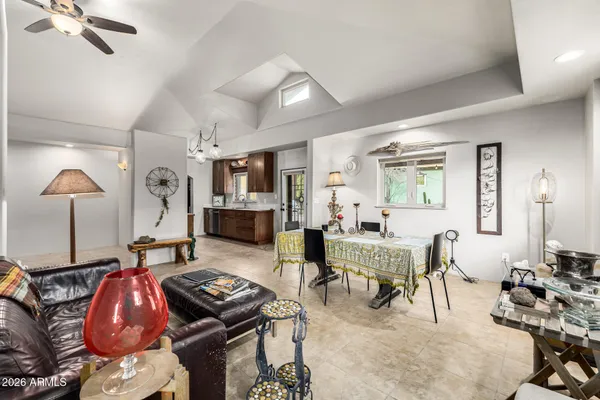 a bathroom with a sink mirror and vanity