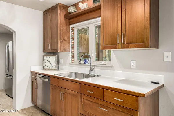 a view of a backyard with a patio