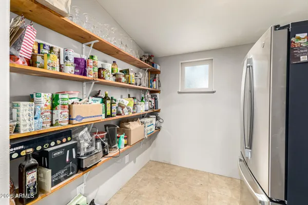 a view of a chairs and tables in the patio