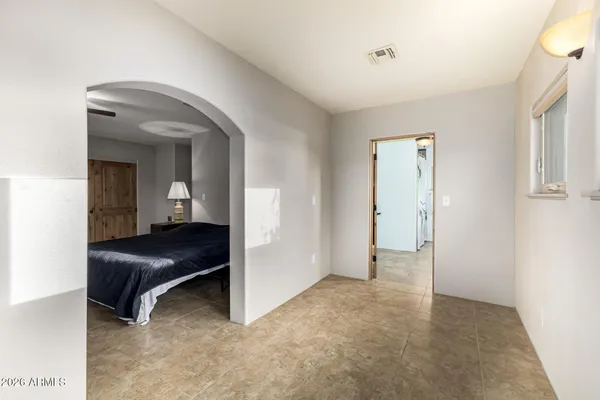 an aerial view of a house with a swimming pool