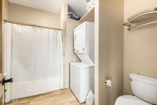 an aerial view of a houses with yard