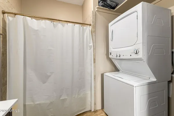 an aerial view of a house with a yard and garden