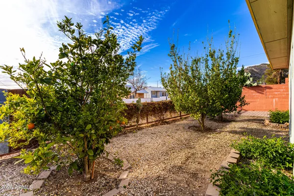 a view of a house with a street