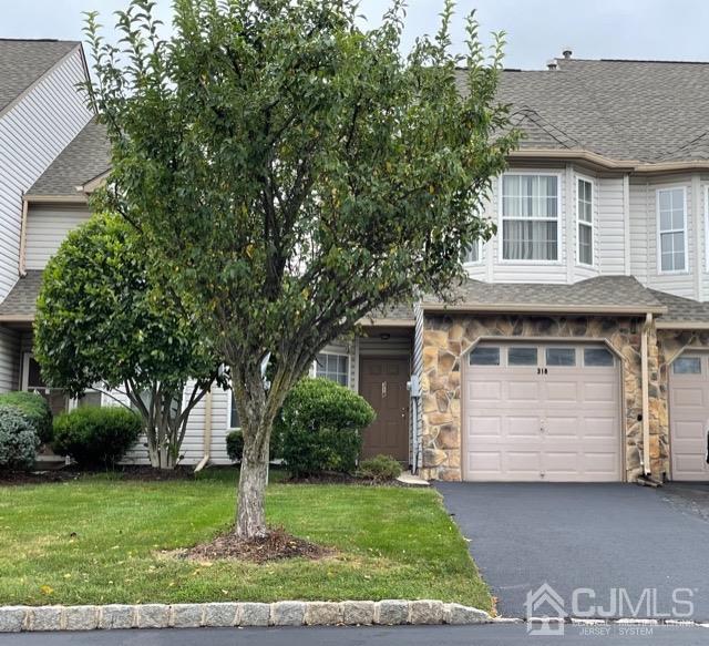 318 Pegasus Road Piscataway, NJ 08854 - Photo 1 of 1 a front view of a house with a garden