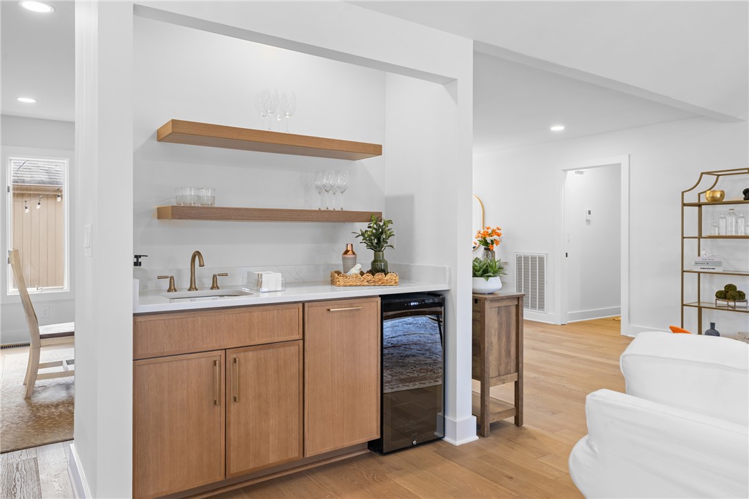 117 Riverpoint Drive Clemson, SC 29631 - Photo 13 of 47 This built-in wet bar with a wine cooler offers seamless entertaining in a refined space.