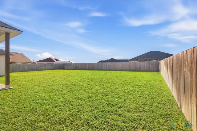 a view of an outdoor space and a yard