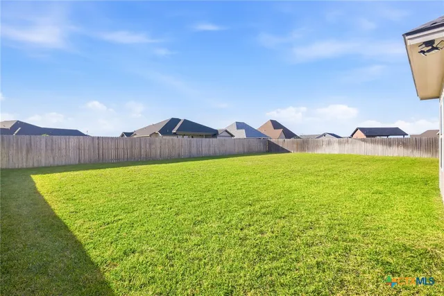 a view of outdoor space and yard