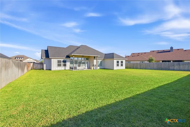 a house view with a garden space