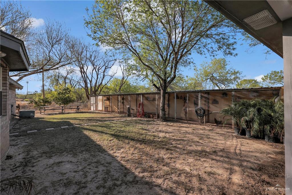 1607 West Main Street Rio Grande City, TX 78582 - Photo 12 of 31 a view of a yard with a tree