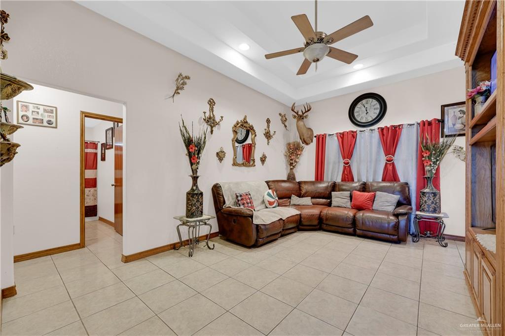 1607 West Main Street Rio Grande City, TX 78582 - Photo 29 of 31 a living room with furniture and a window
