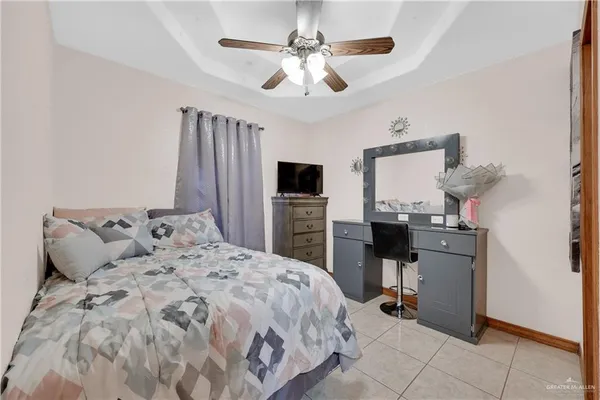 a living room with furniture and a clock