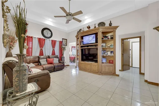 a bedroom with bed and a couch