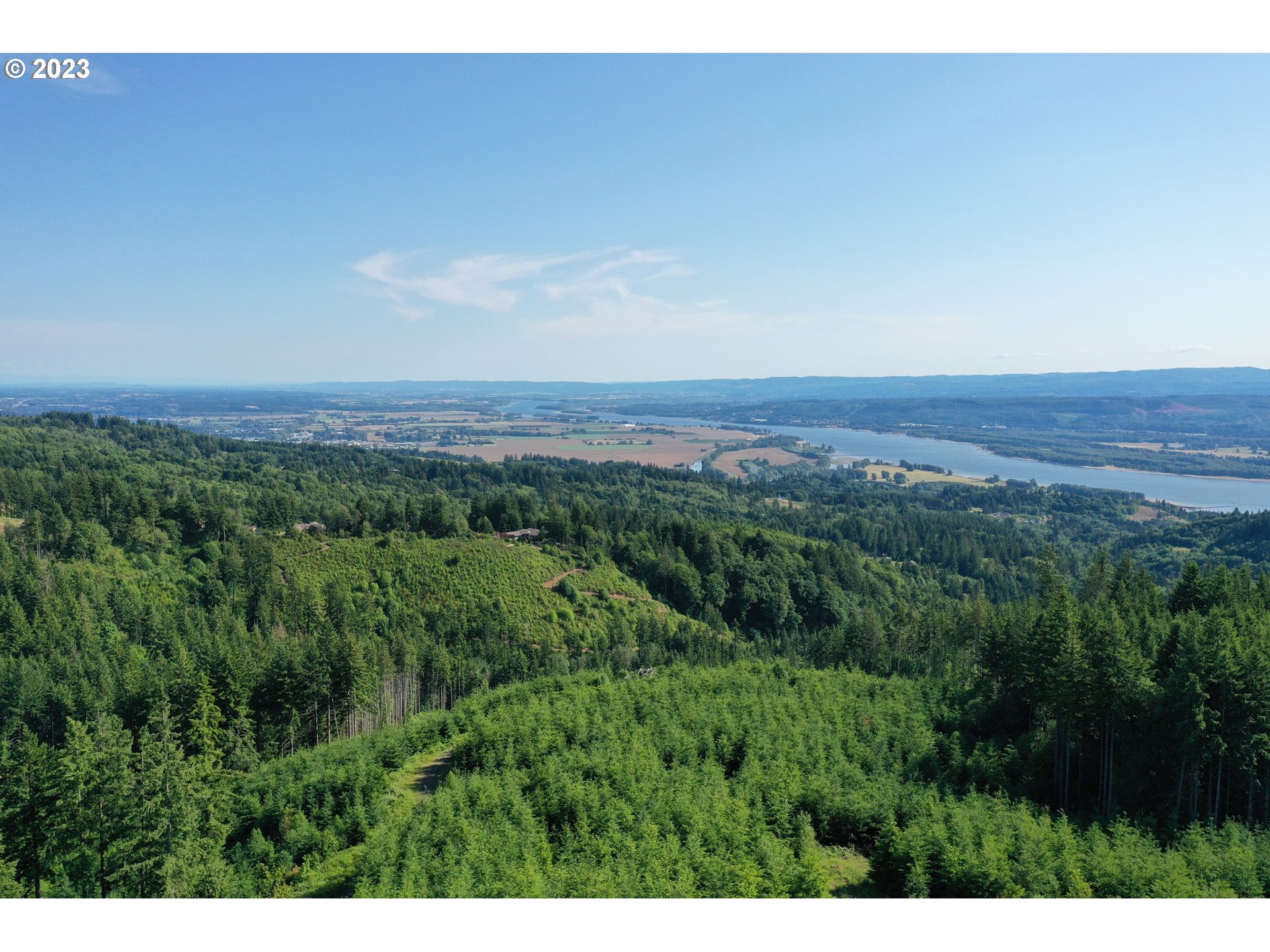 2987 Green Mountain Road, Unit D Kalama, WA 98625 - Photo 1 of 19 a view of a lush green field