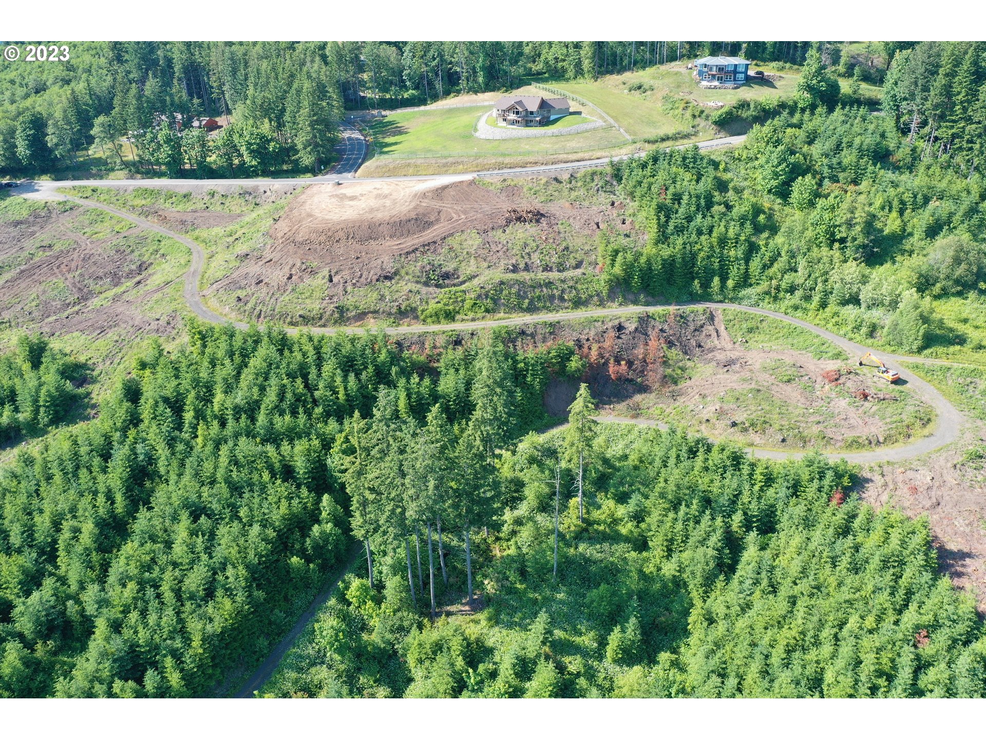 2987 Green Mountain Road, Unit D Kalama, WA 98625 - Photo 14 of 19 a view of a street with a yard