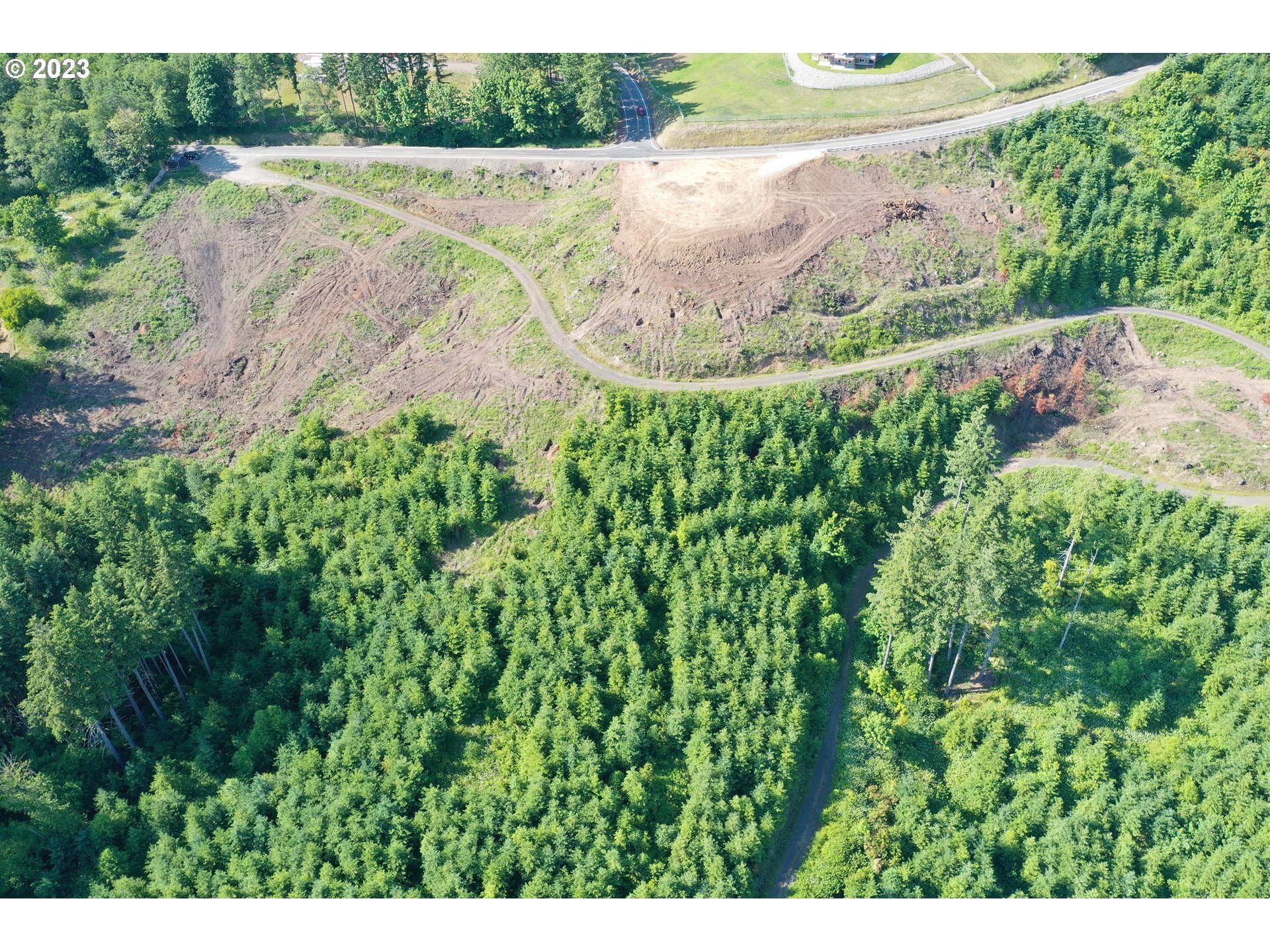 2987 Green Mountain Road, Unit D Kalama, WA 98625 - Photo 18 of 19 a view of a lake in middle of the forest