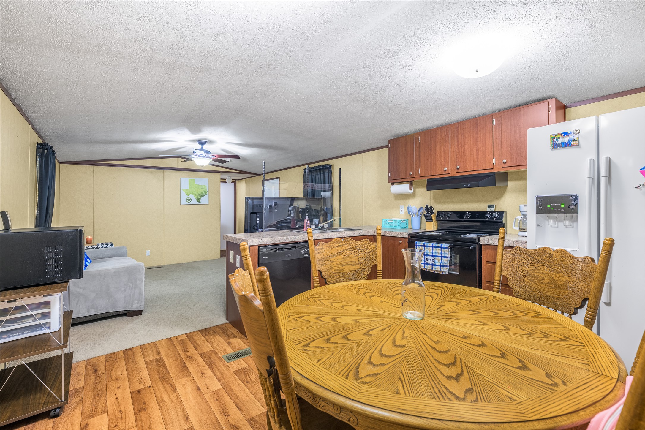 3940 Davis Road West Point, TX 78963 - Photo 12 of 22 a living room with furniture and a view of kitchen